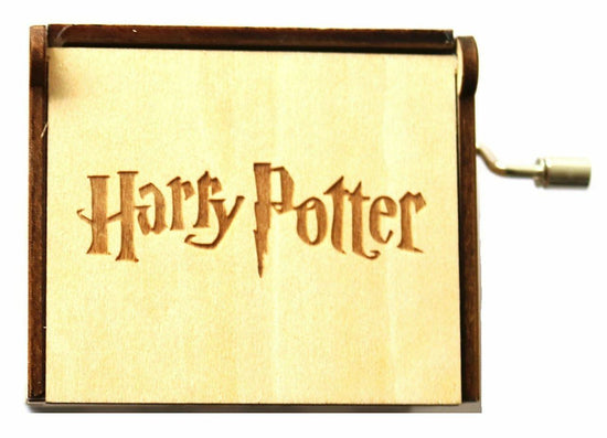 Load image into Gallery viewer, Harry Potter Theamed Music Box Plays The Harry Potter Theme Song Made from Wood With House Badges
